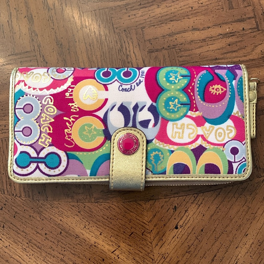 Colorful COACH wallet. Excellent condition. Care instructions inside.